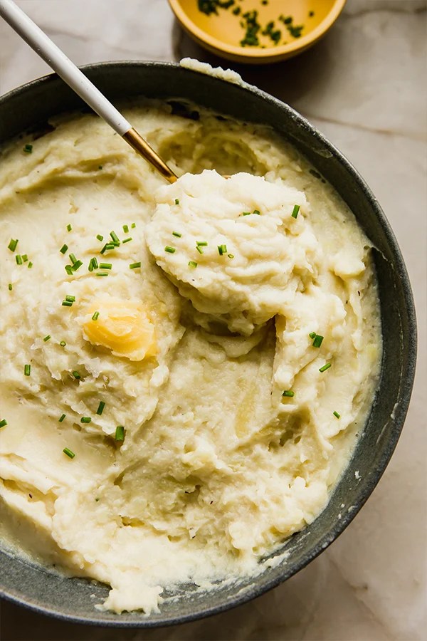Dish of mashed white sweet potato.