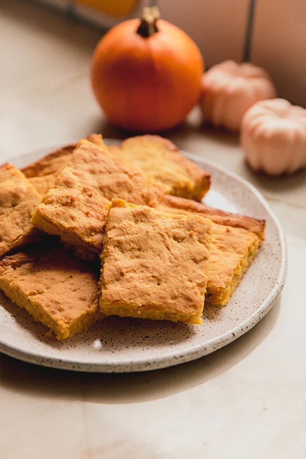 Plate stacked with \"corn\" bread.