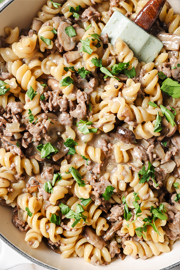 A close up photo of a pot of homemade beef stroganoff hamburger helper.