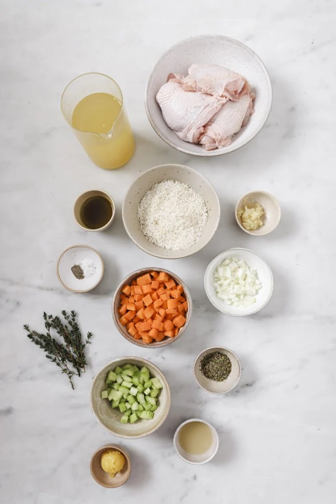 One pot chicken and rice ingredients laid out in separate bowls