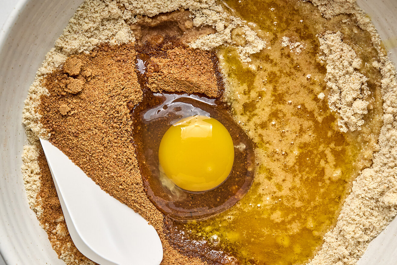 Cookie bar ingredients in a bowl, unmixed.