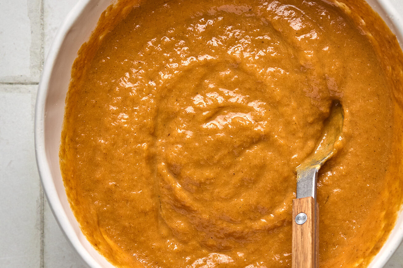 Pumpkin pie layer ingredients mixed well in a bowl.