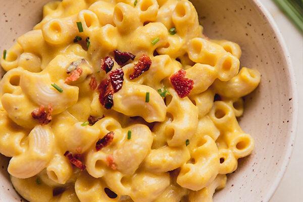 Mac and cheese topped with bacon and chives. 