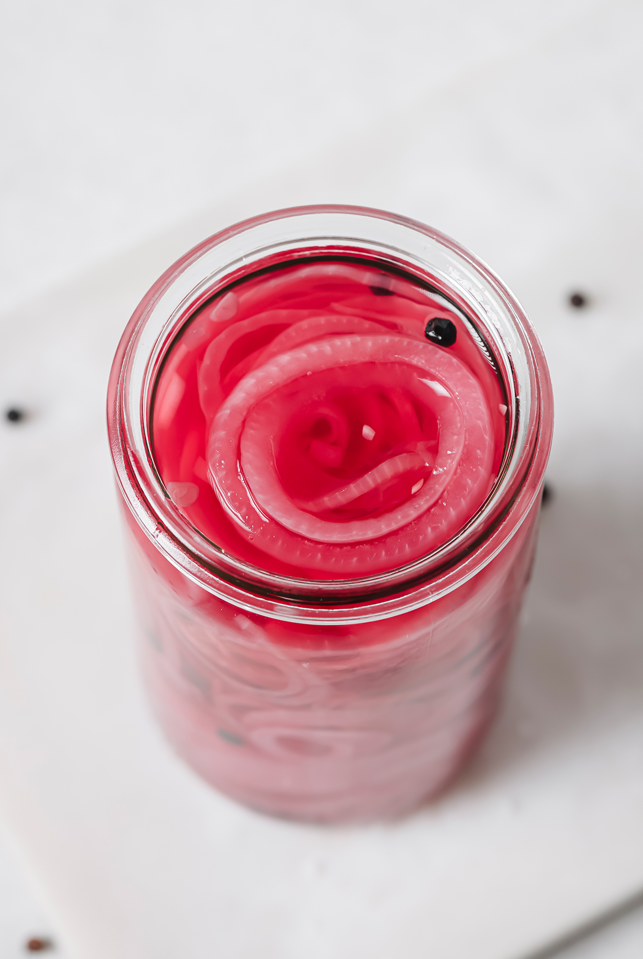 apple cider vinegar pickled onions in a jar