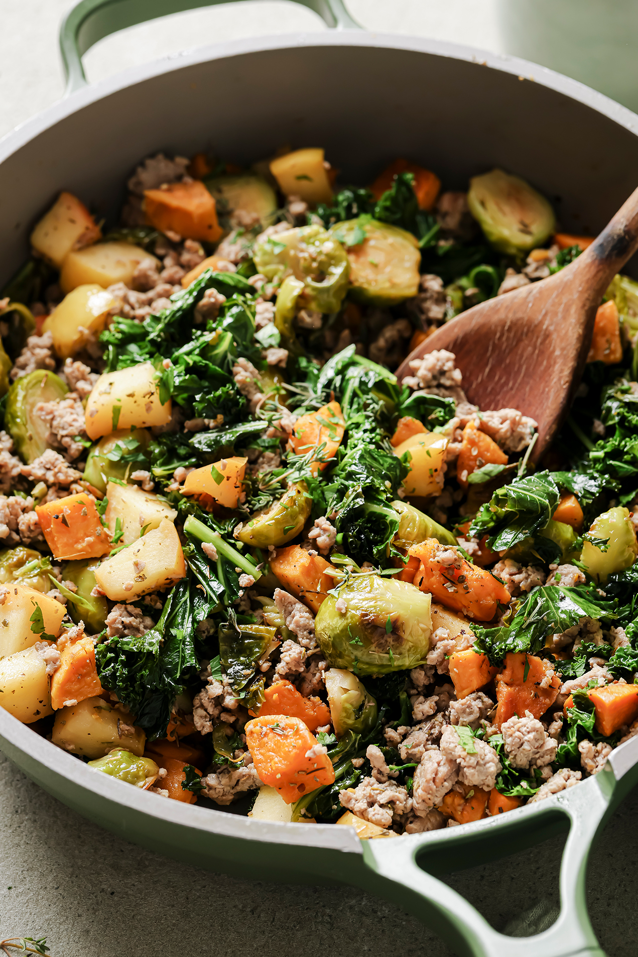 Turkey and veggie hash in a skillet.