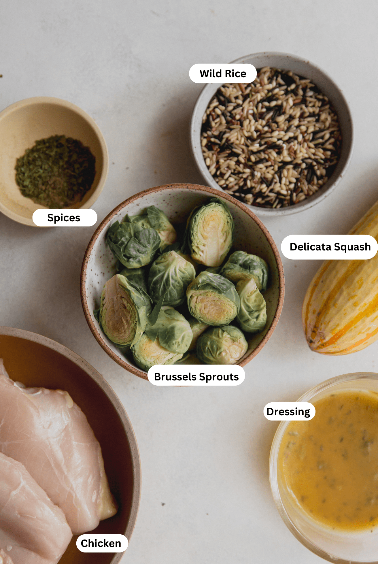 All the ingredients for roasted squash and chicken harvest bowls.