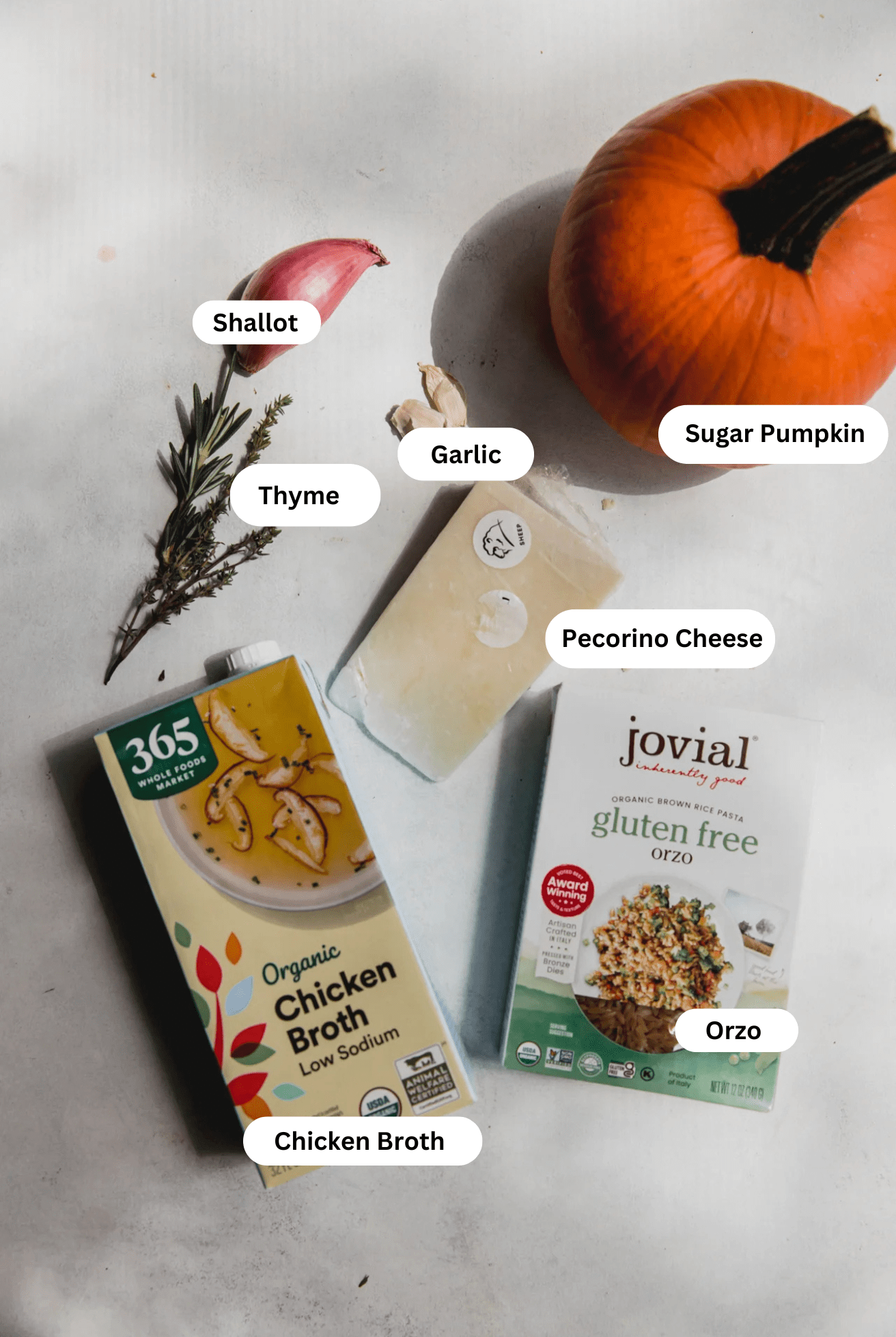 Pumpkin orzo ingredients laid out on a table.