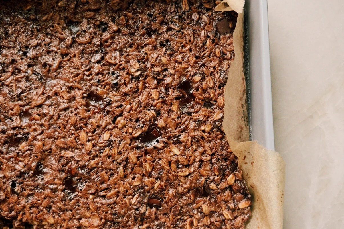The baked oats in a baking pan after baking.