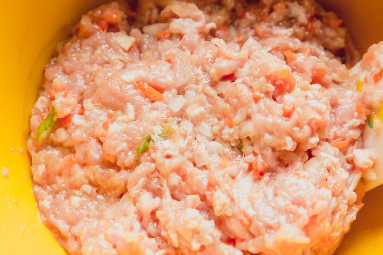Cabbage dumpling filling mixed in a bowl