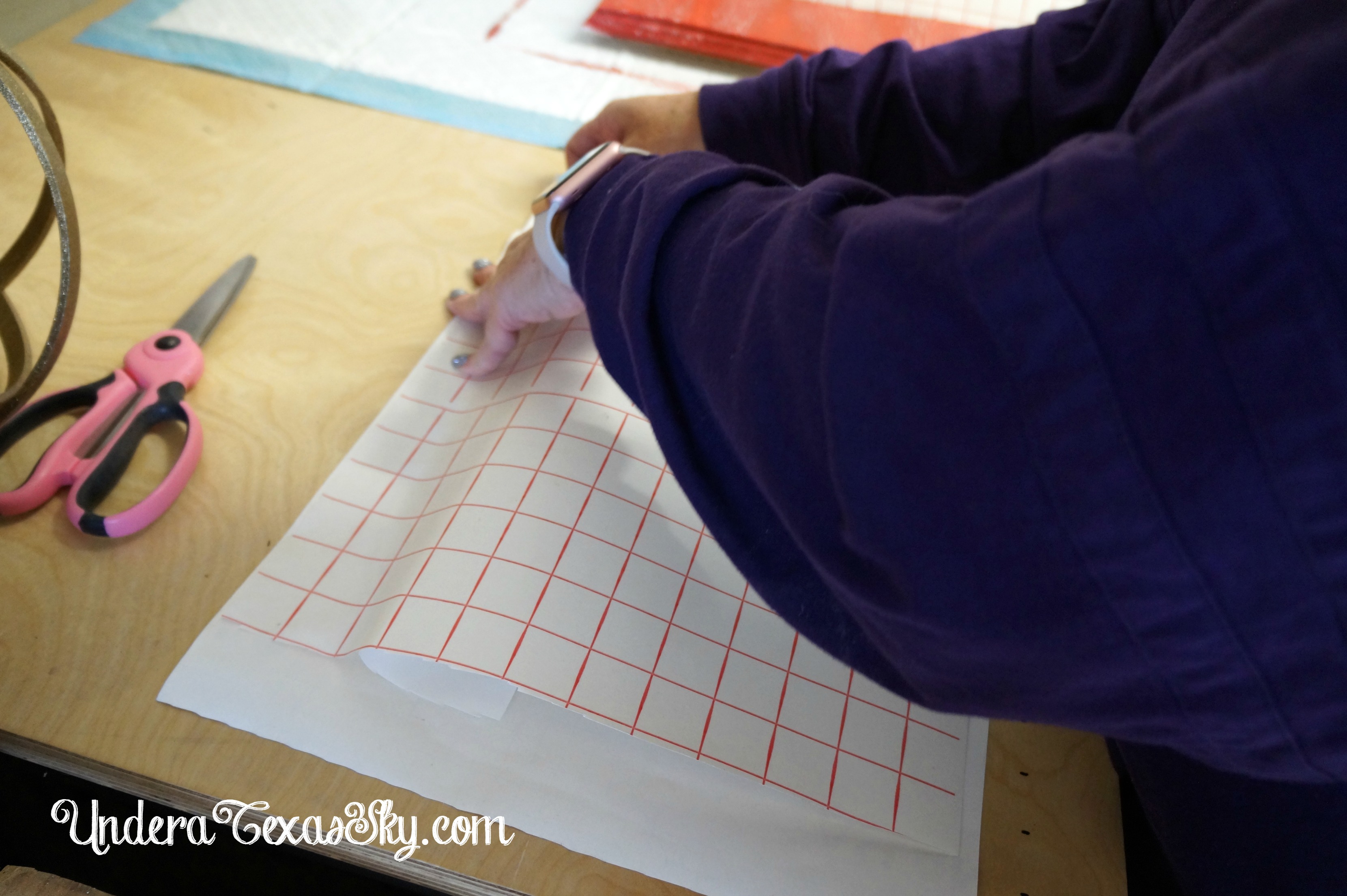 Adding Vinyl Letters to a Wood Sign Under a Texas Sky
