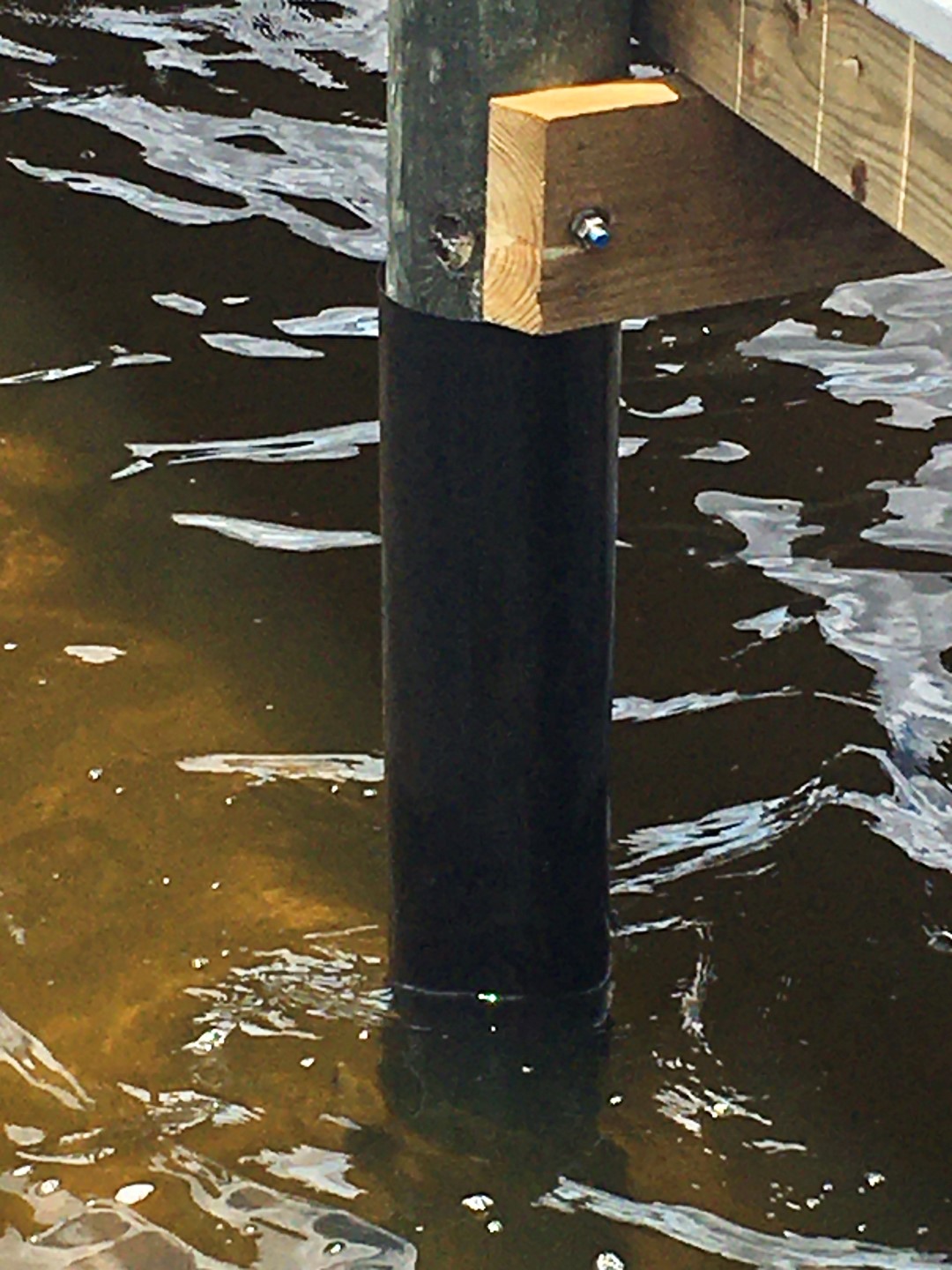 Piling Wraps Under Dock Reef