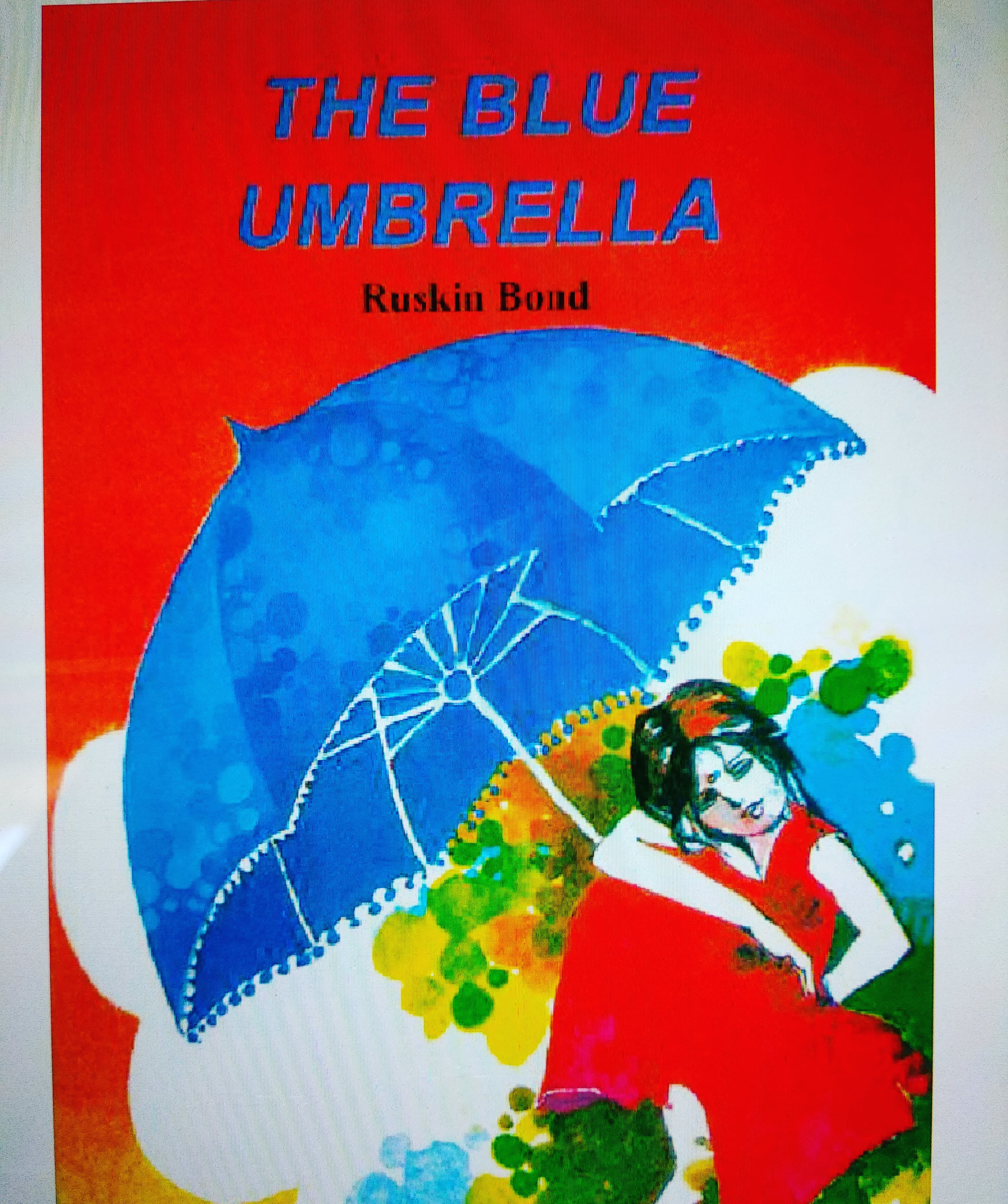 The Blue Umbrella Under the Cloud's Shadow