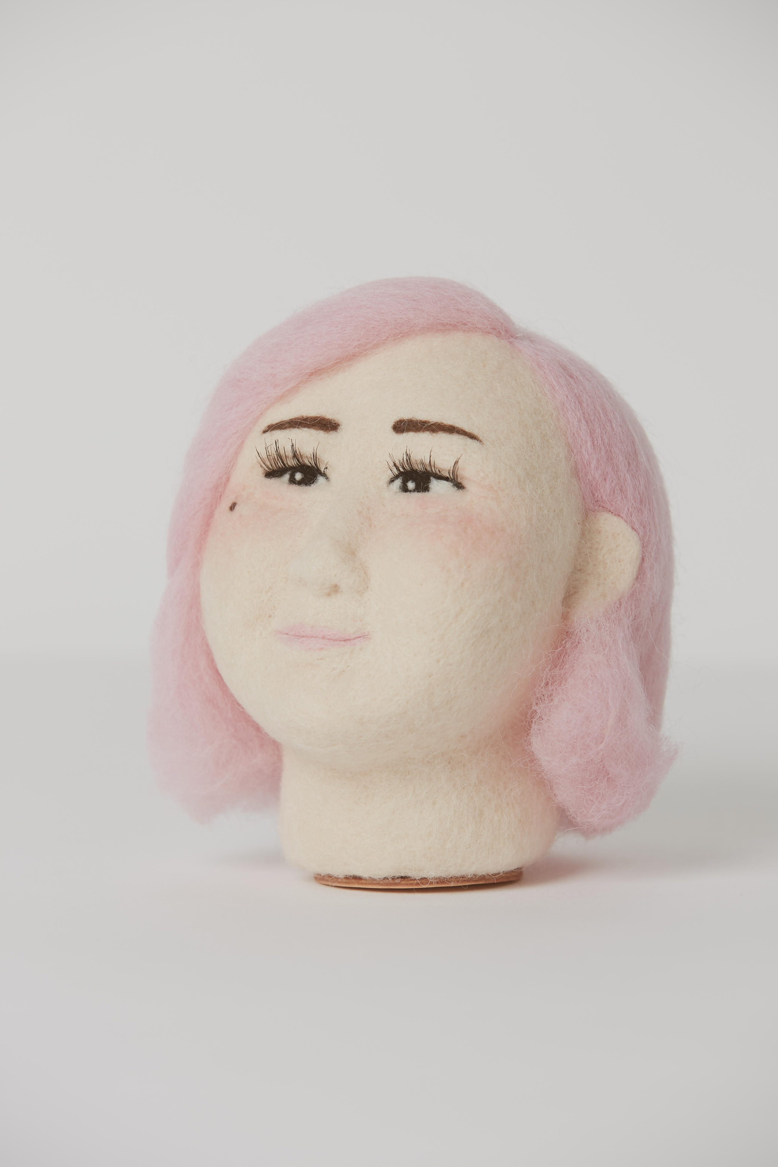 une felt wool felt artist makes needle felt or wet felt sculptures