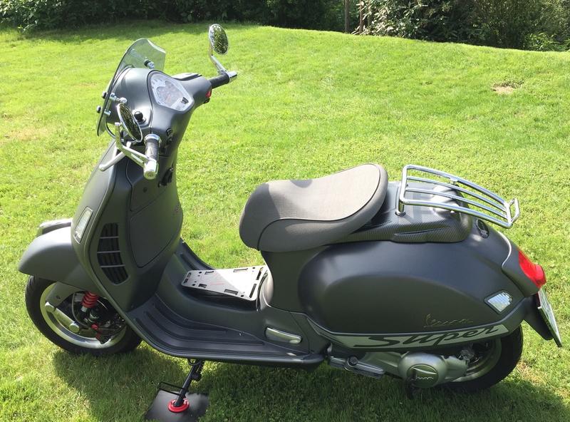 Modern Vespa GTS with seat of GTV