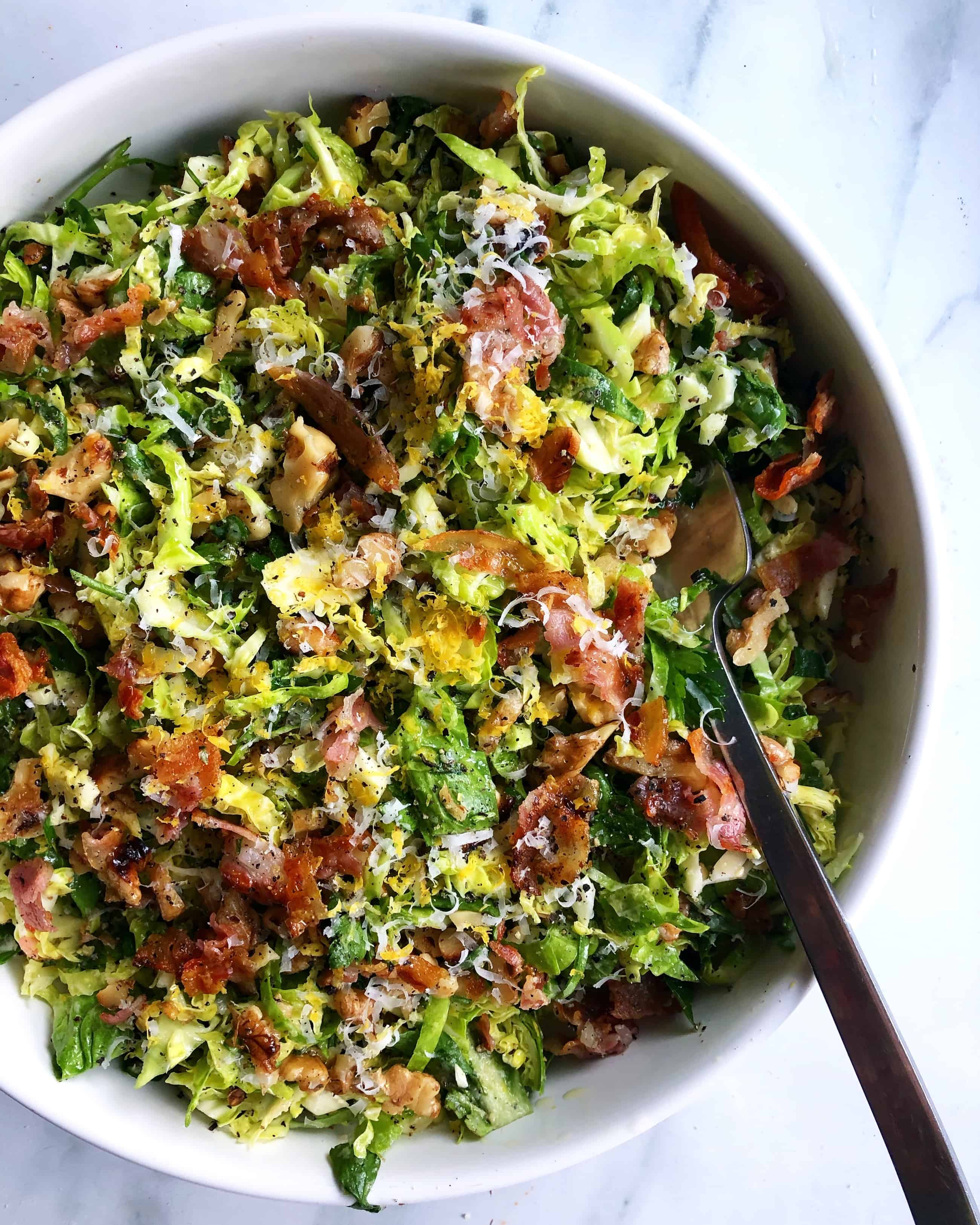 Shaved Brussels Sprout Salad with Crispy Bacon, Parmesan, and Toasted