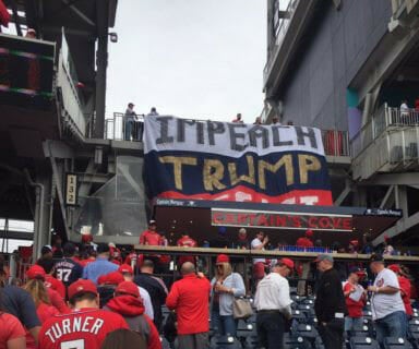 Protesters Hang 'Impeach Trump' Sign at Washington Nationals Opener