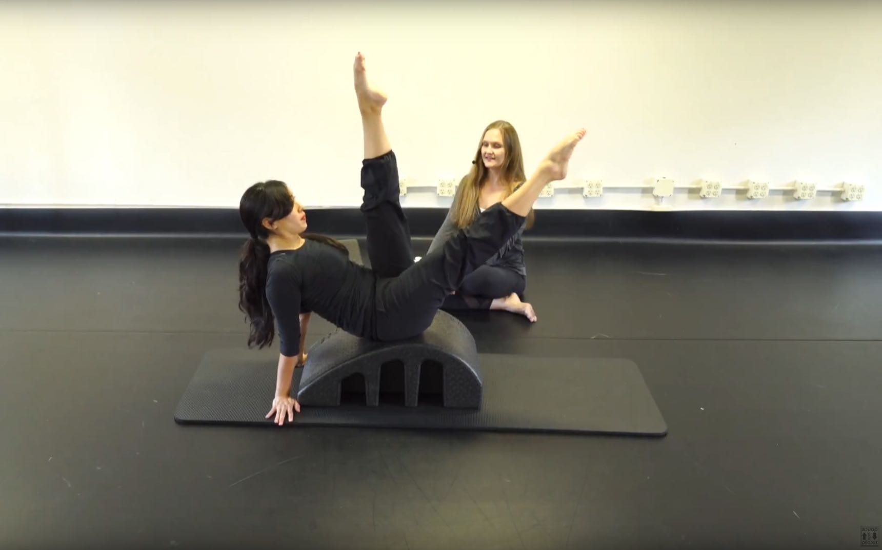Scissors on Arc Barrel_UpsideDown Pilates_Pilates Hawaii_Pilates