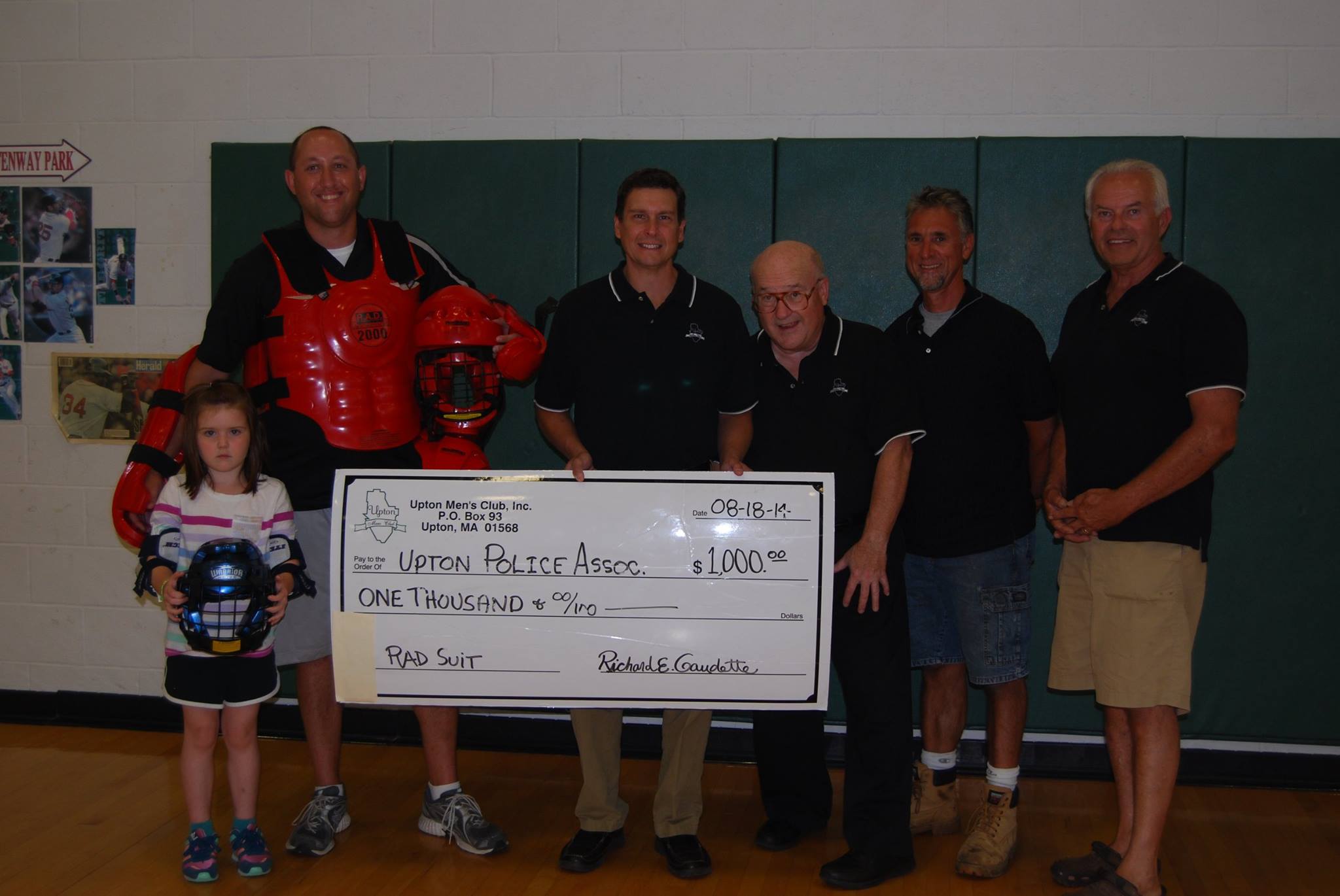 Upton Men’s Club make donation towards Radkids and RAD adult safety