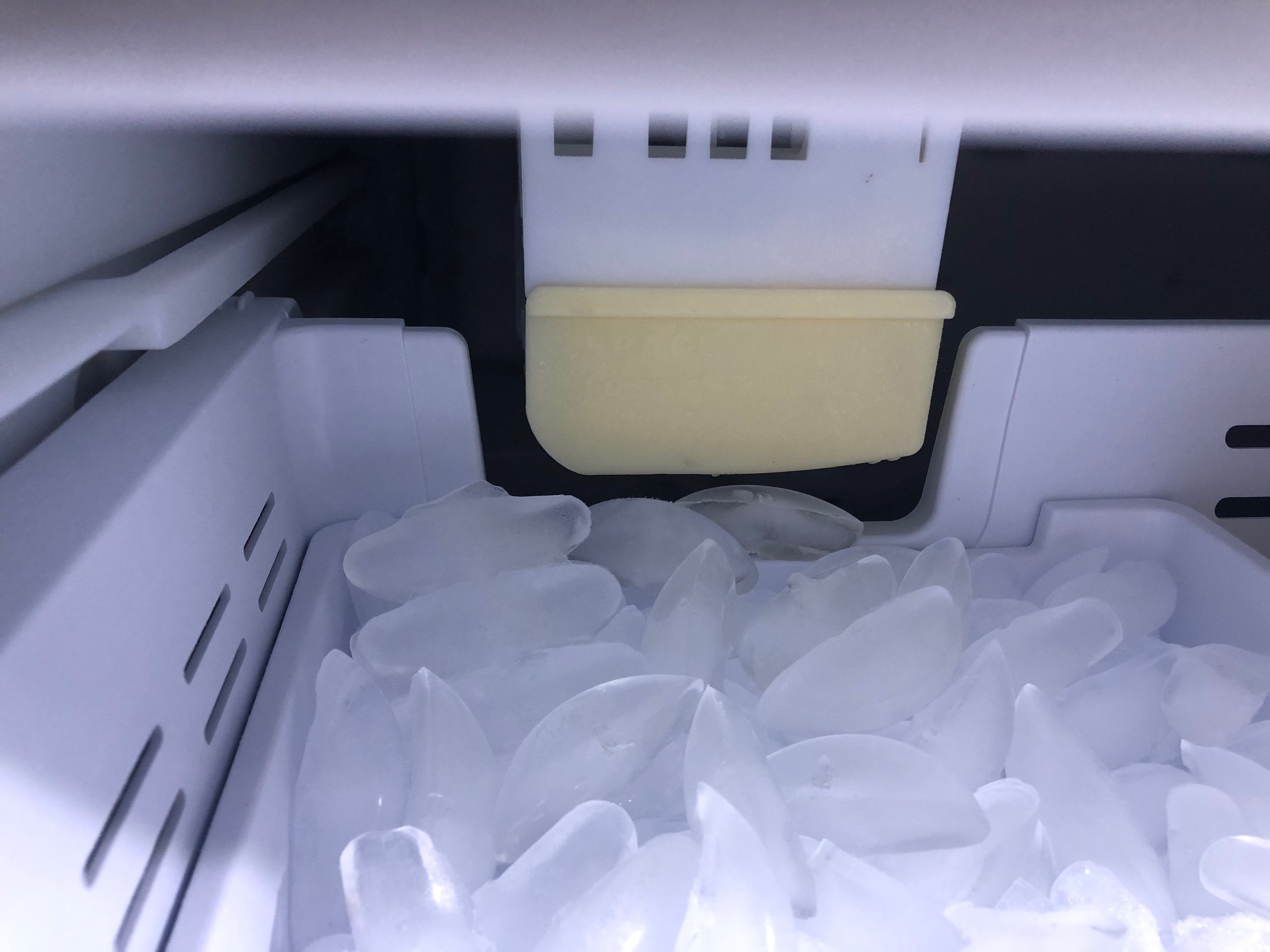 Solved my ice maker drops ice on floor when i open the fr... Samsung