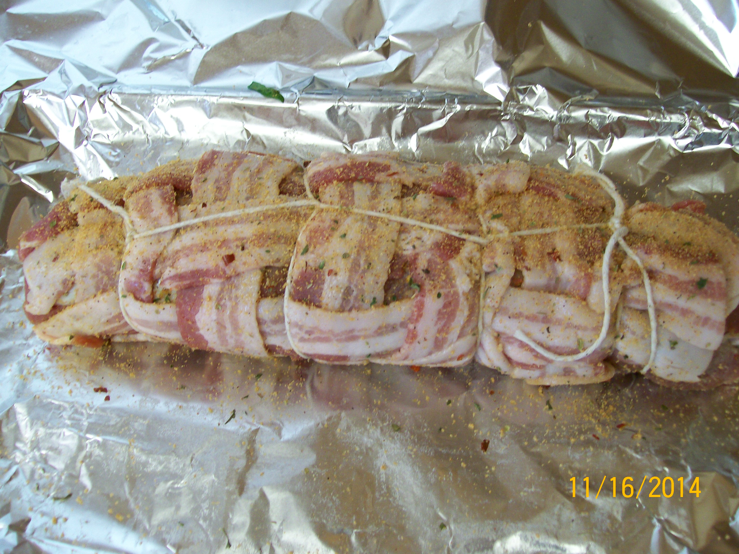 First pork tenderloin stuffed with spinach,3 cheeses and bacon lattice
