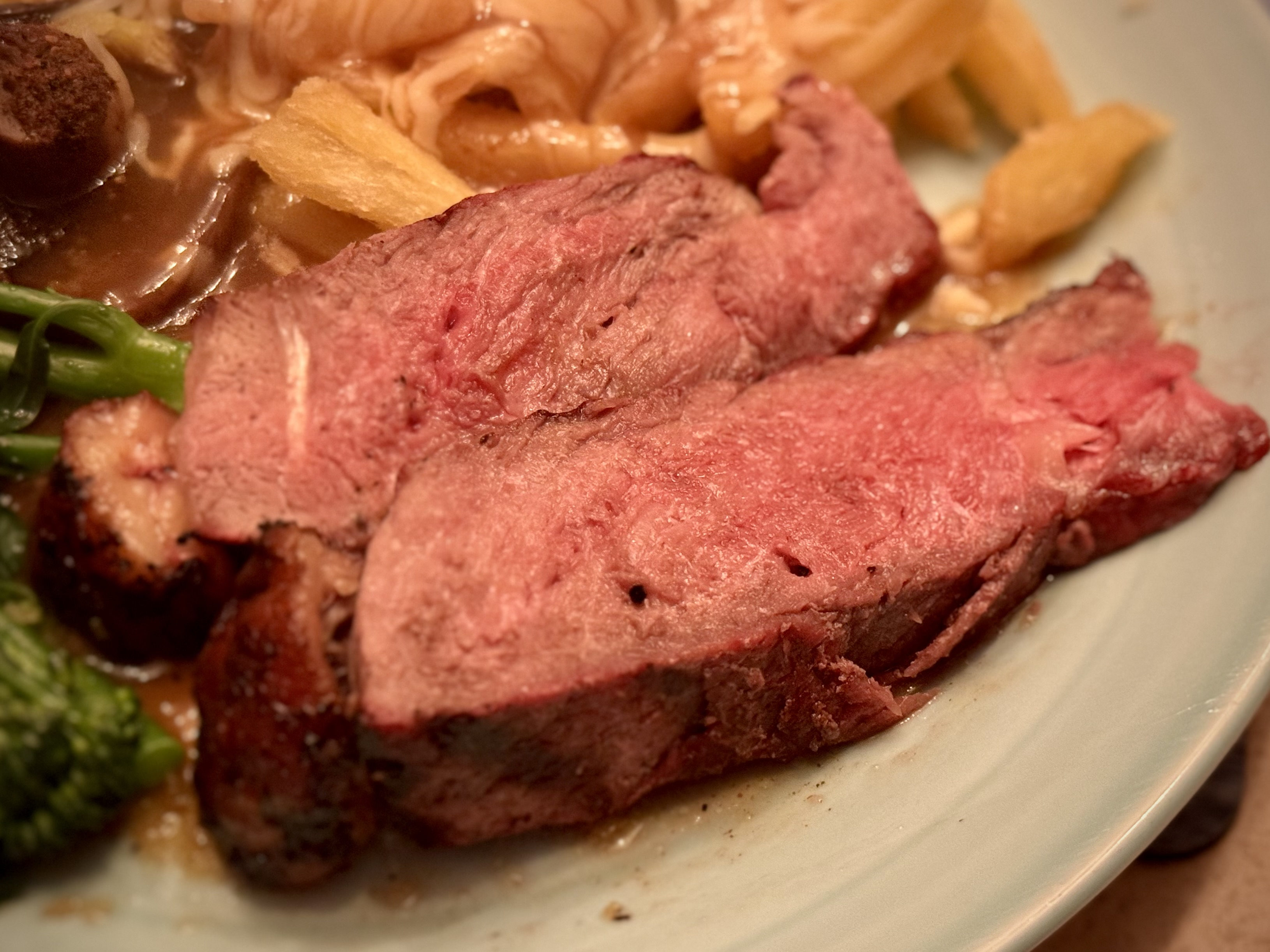 Cote de boeuf reverse seared over alder wood served with poutine — Big