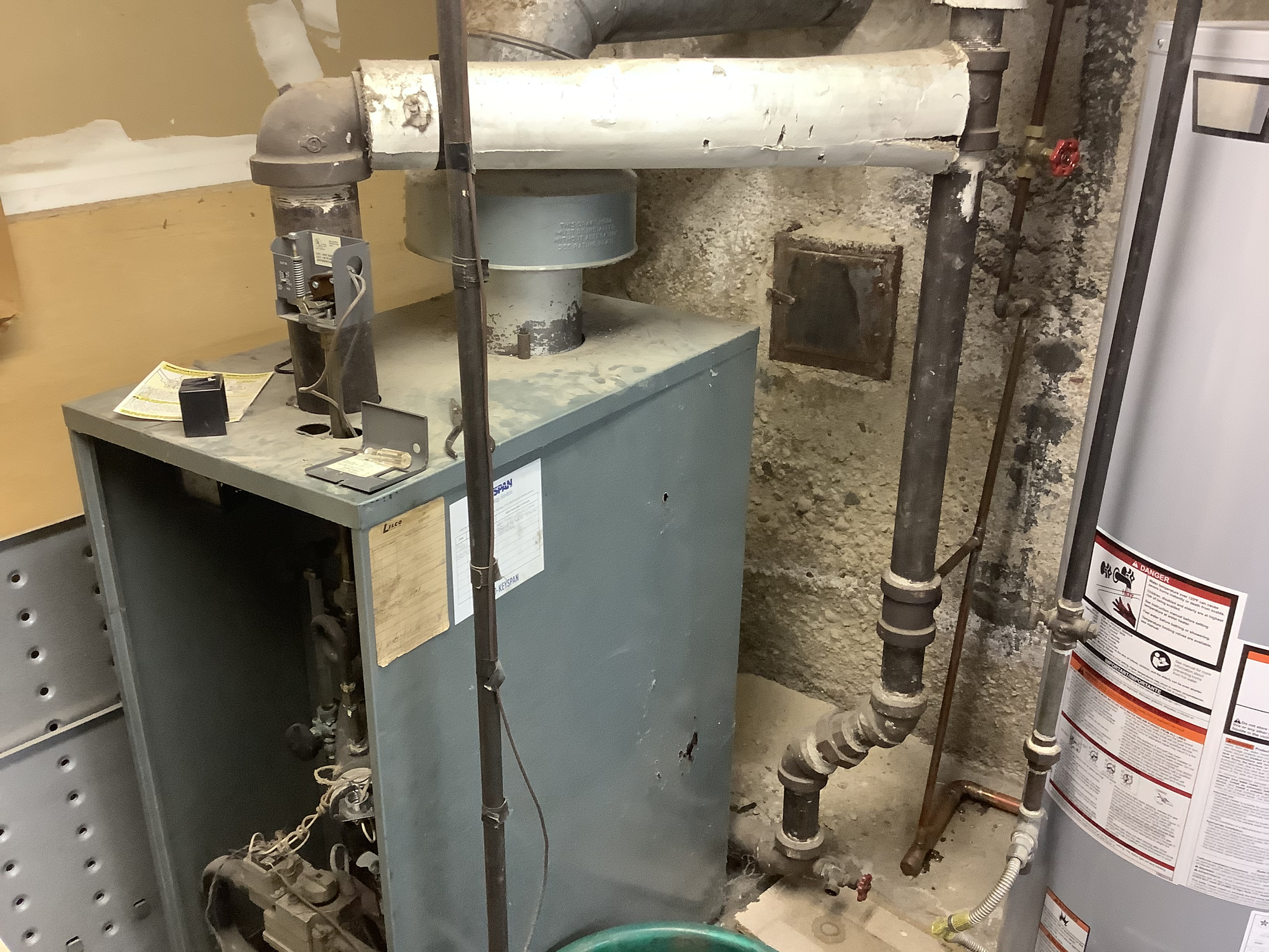 Steam heat has lots of hammering since getting return replaced and hot water heater changed