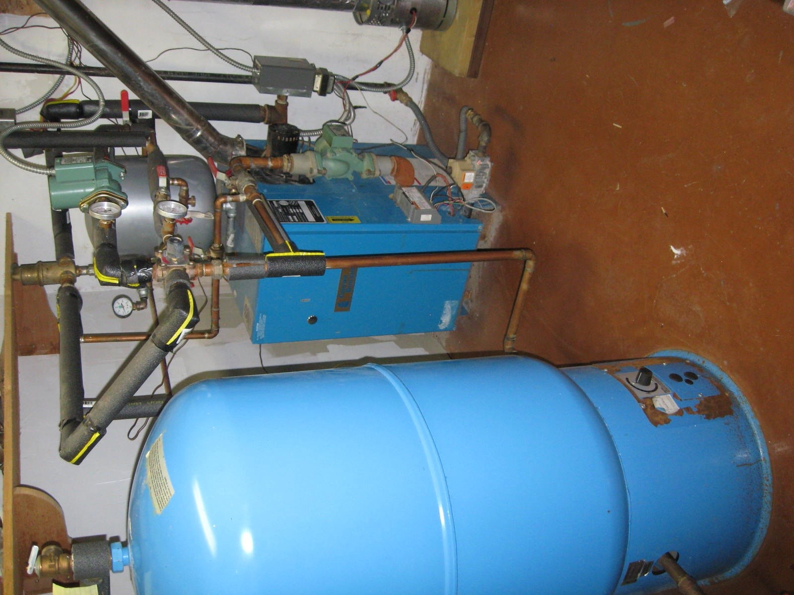 boiler vs tankless HVAC — Heating Help The Wall