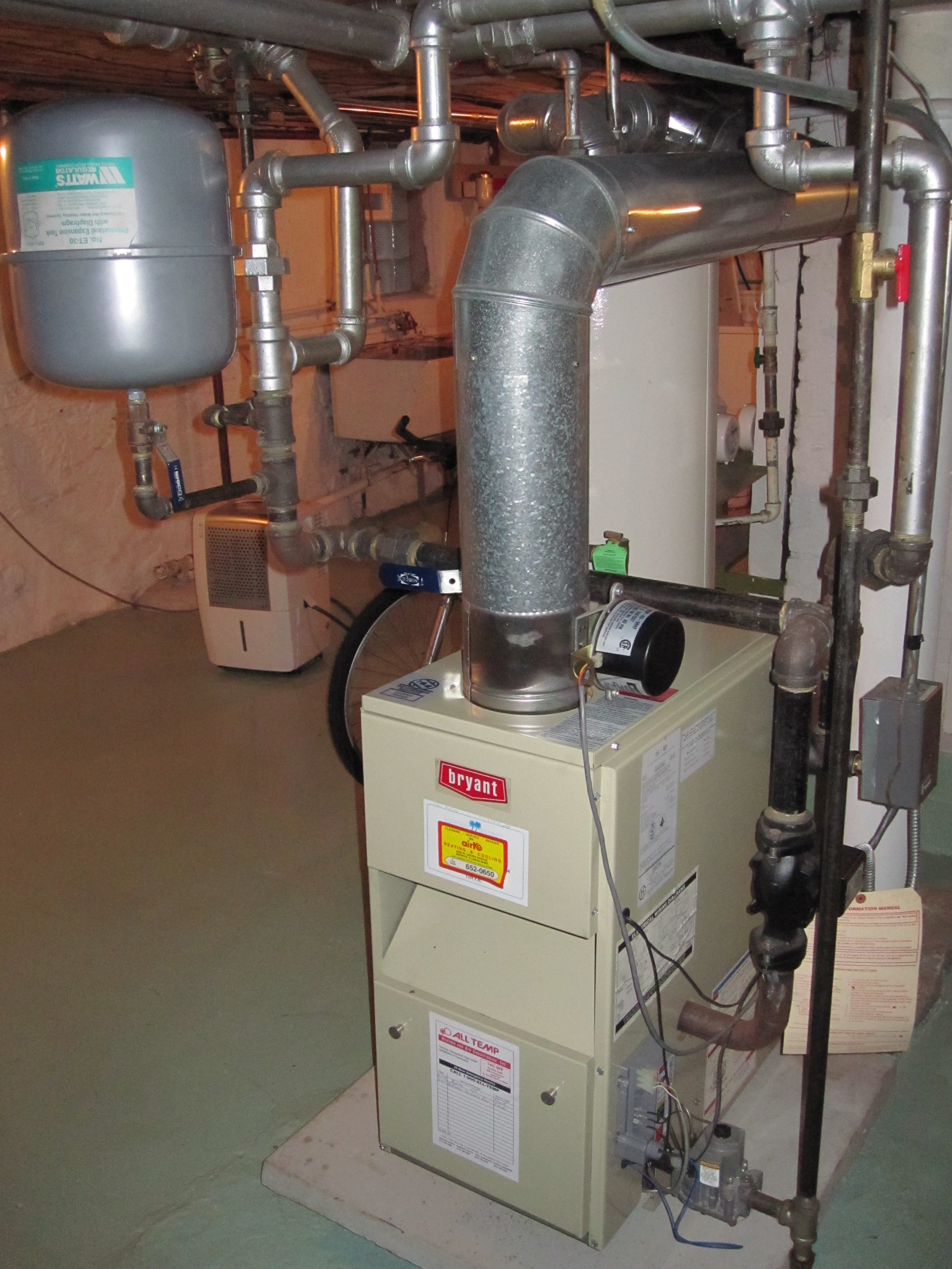 Signs of condensation in and around boiler Concerning? — Heating Help The Wall