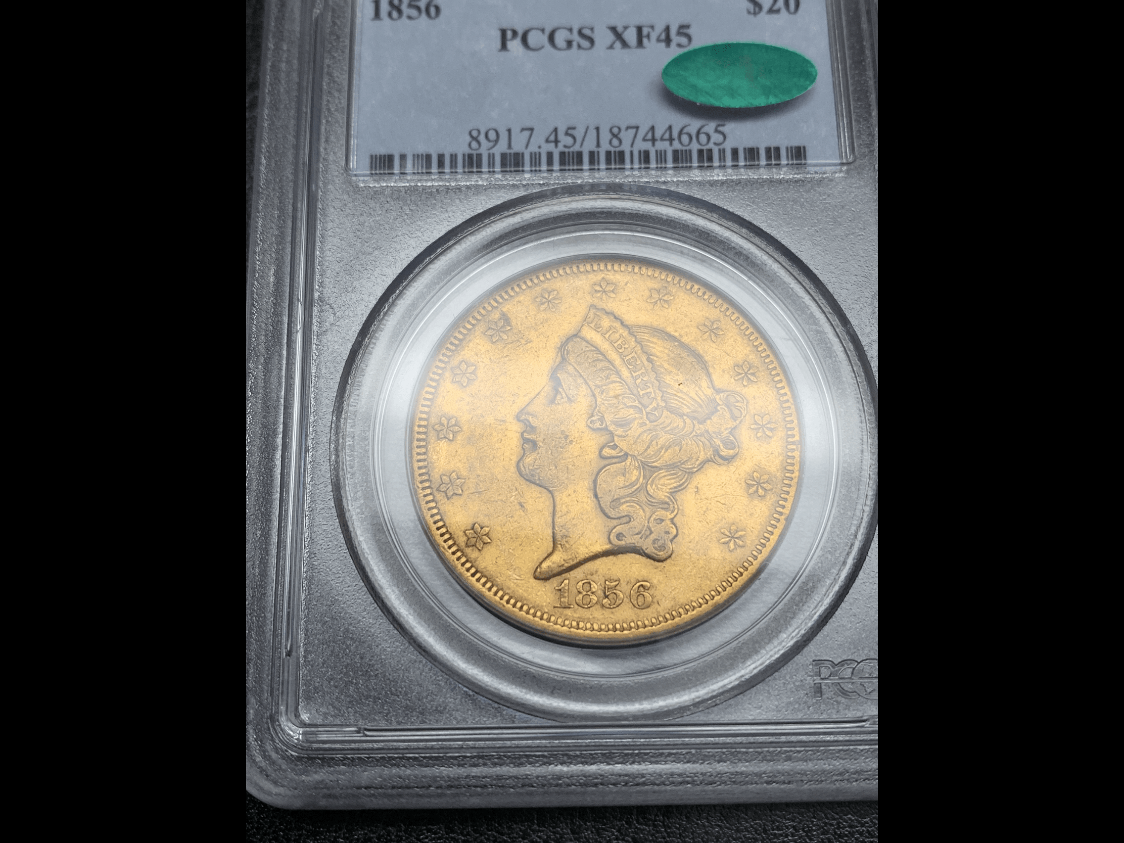 How do we reconcile buying gold coins during historic high spot prices