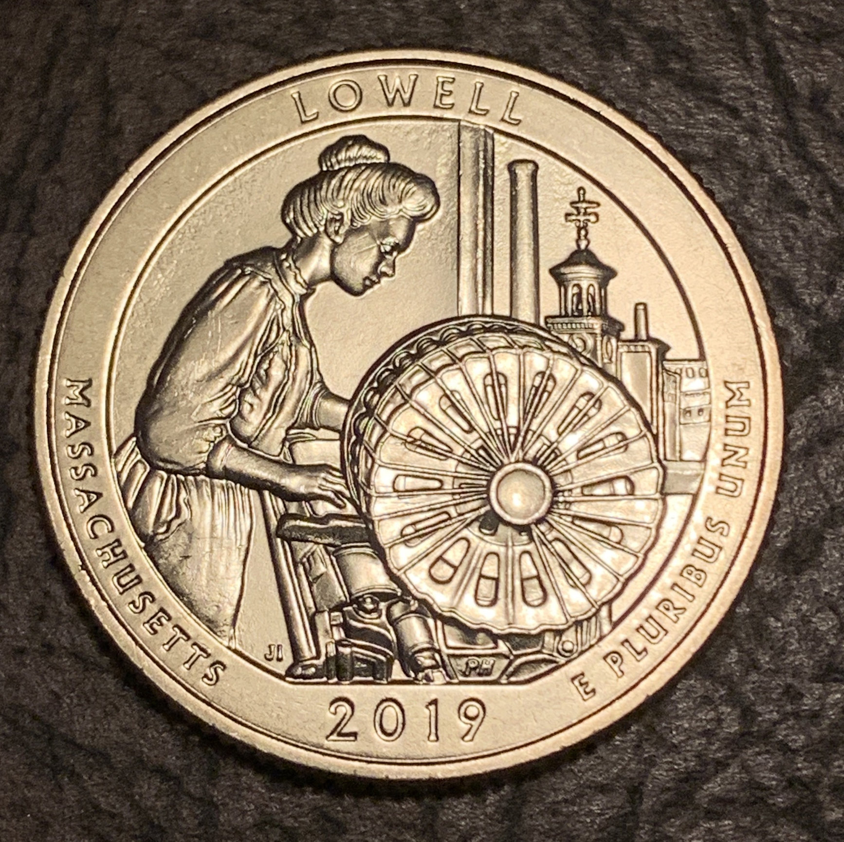 The Lowell quarter inhand looks fantastic — Collectors Universe