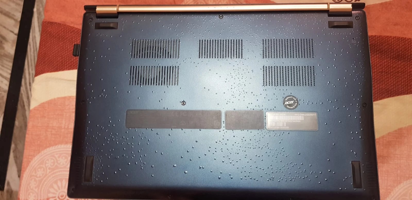 There are bubbles formation on the back side of my Acer Swift 5 laptop