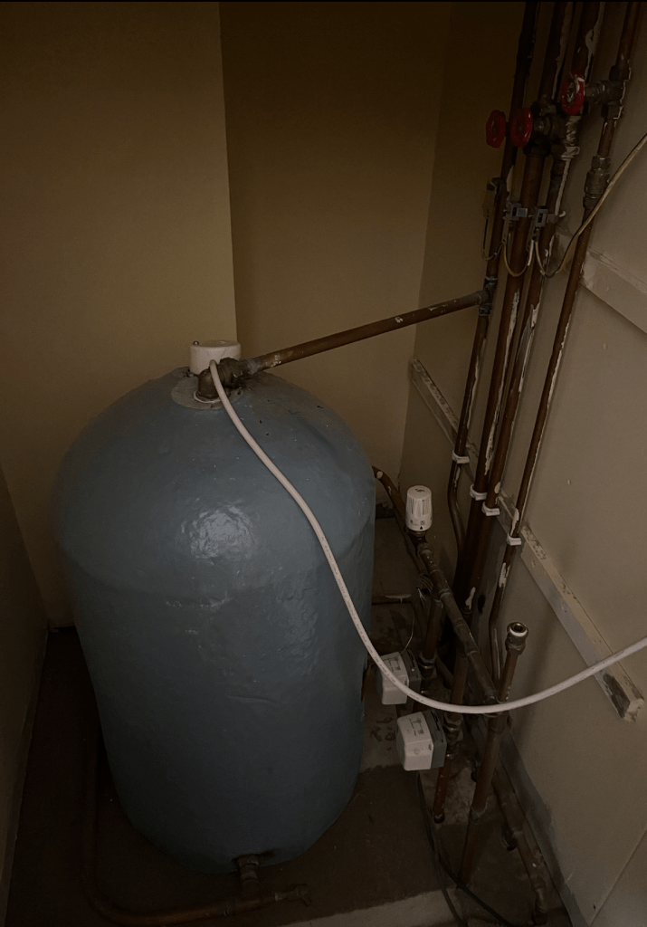 How to increase boiler pressure from hot water tank in cupboard