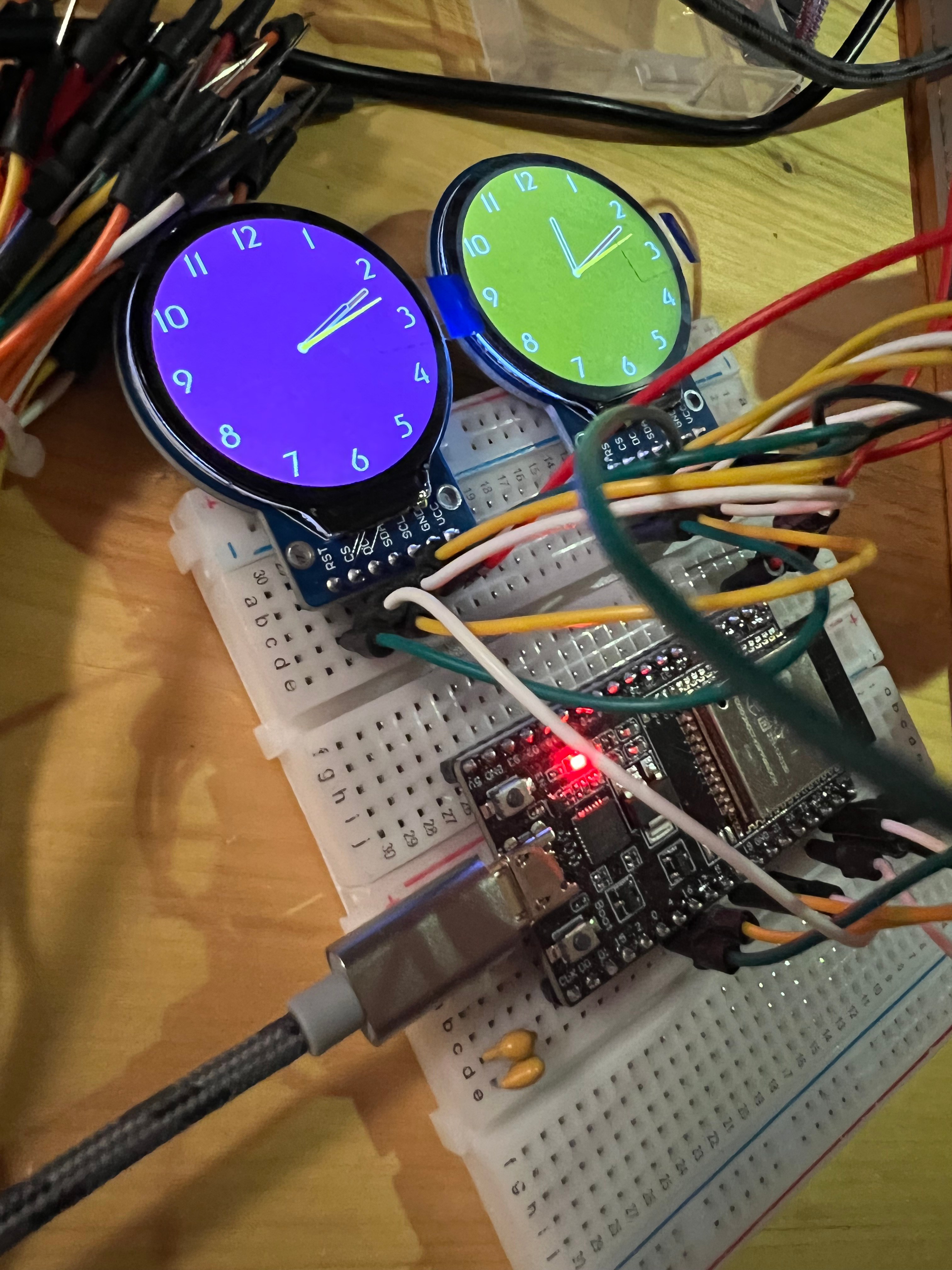 GitHub somebox/esp32GC9A01round example showing two different