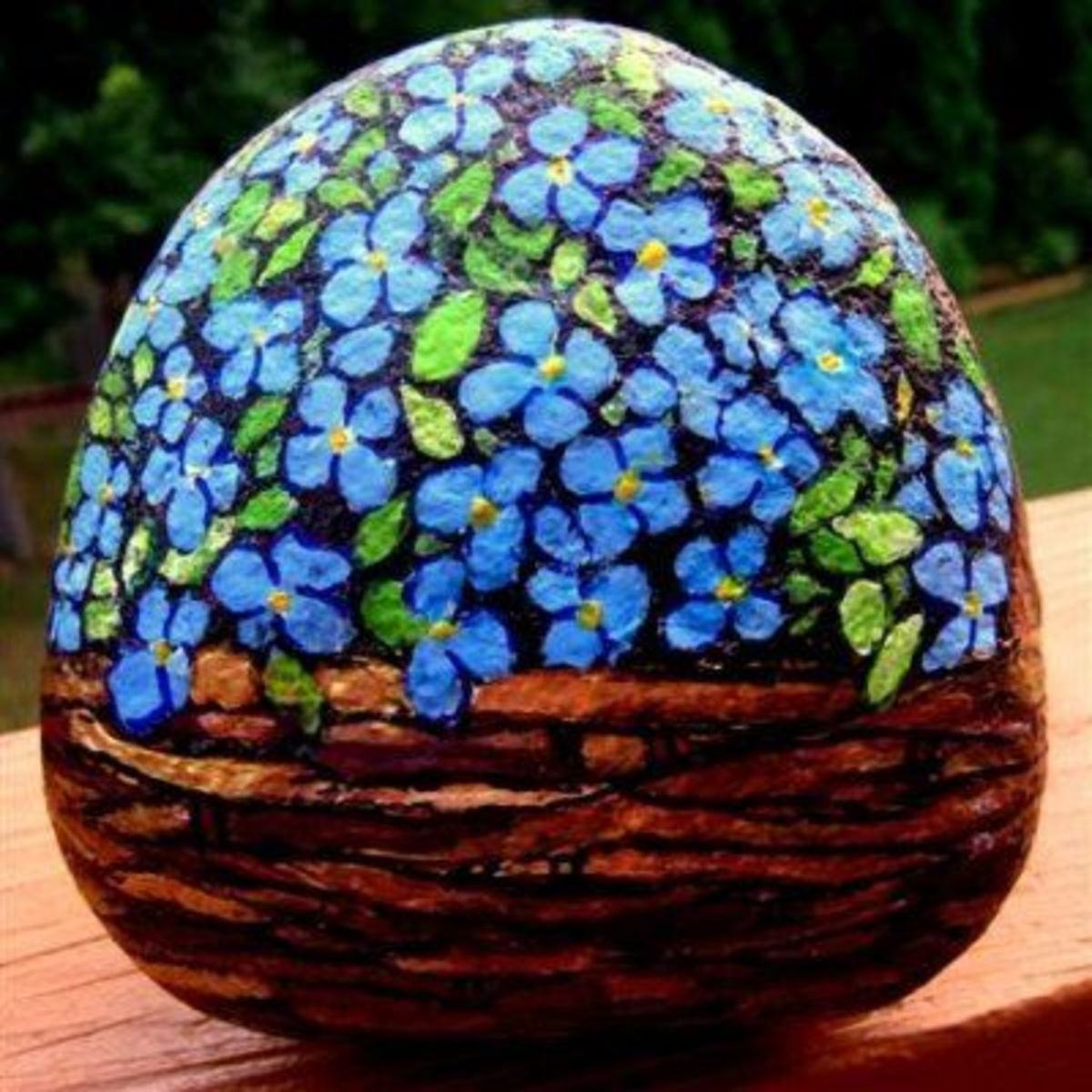 HandPainting Flowers and Fairies on Garden Rocks to Make Beautiful
