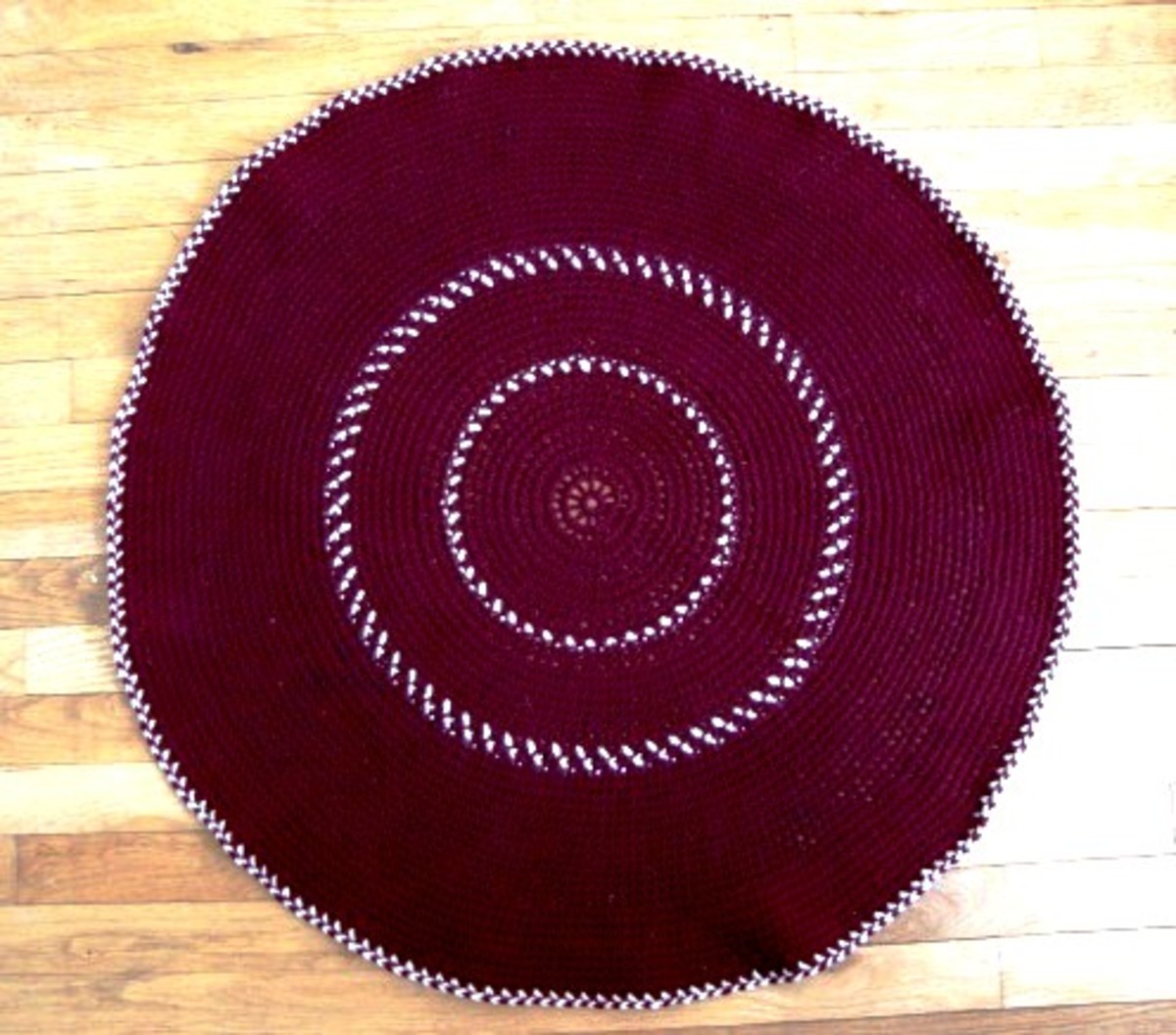 How to Crochet a Round Rug With Roses on It