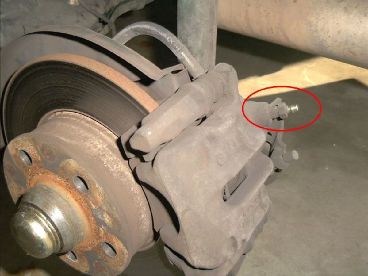 How to Replace a Brake Caliper AxleAddict
