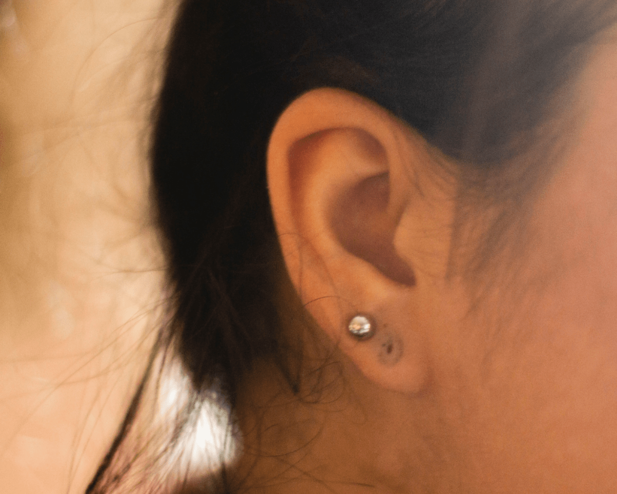 What to Do If the Skin Around Your Piercing Turns Gray or Black TatRing