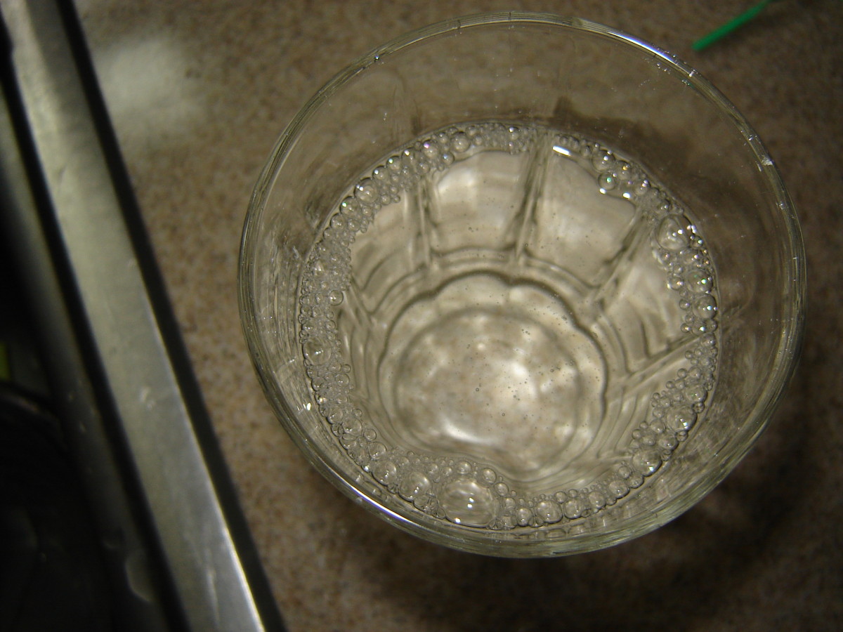 How to Clean Your Dishwasher and Remove the Cloudy Film from Glasses