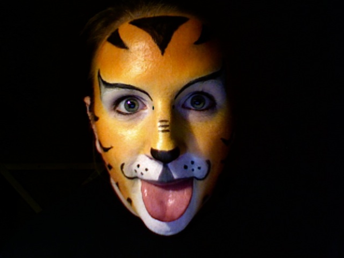 Face Painting Tutorials How to Paint an Easy Tiger Face for Halloween