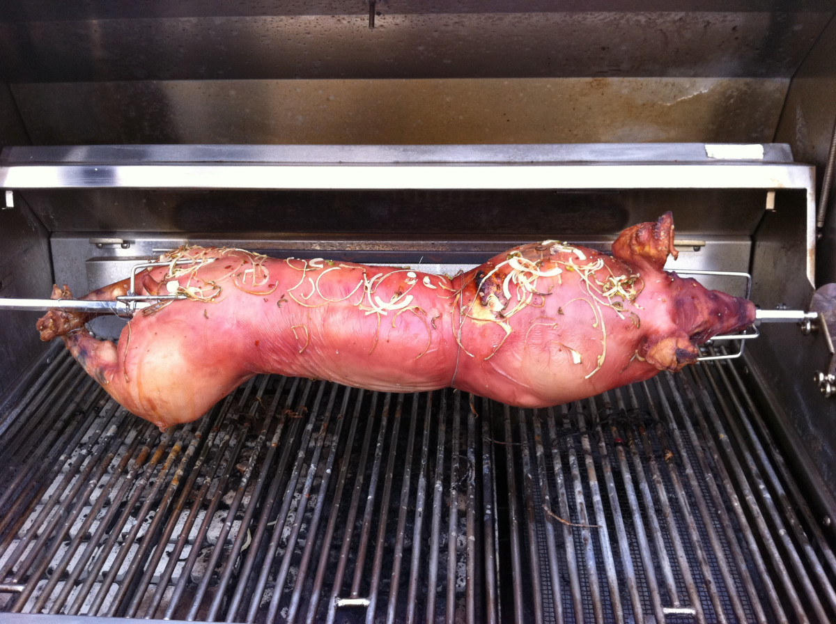 SpitRoasted Pig on the Barbecue Delishably