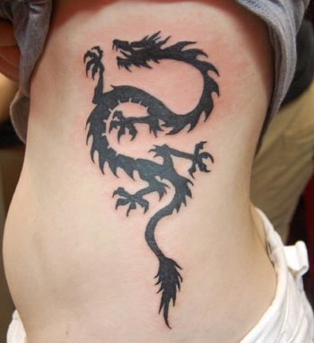Dragon Tattoo Photos and What They Mean TatRing