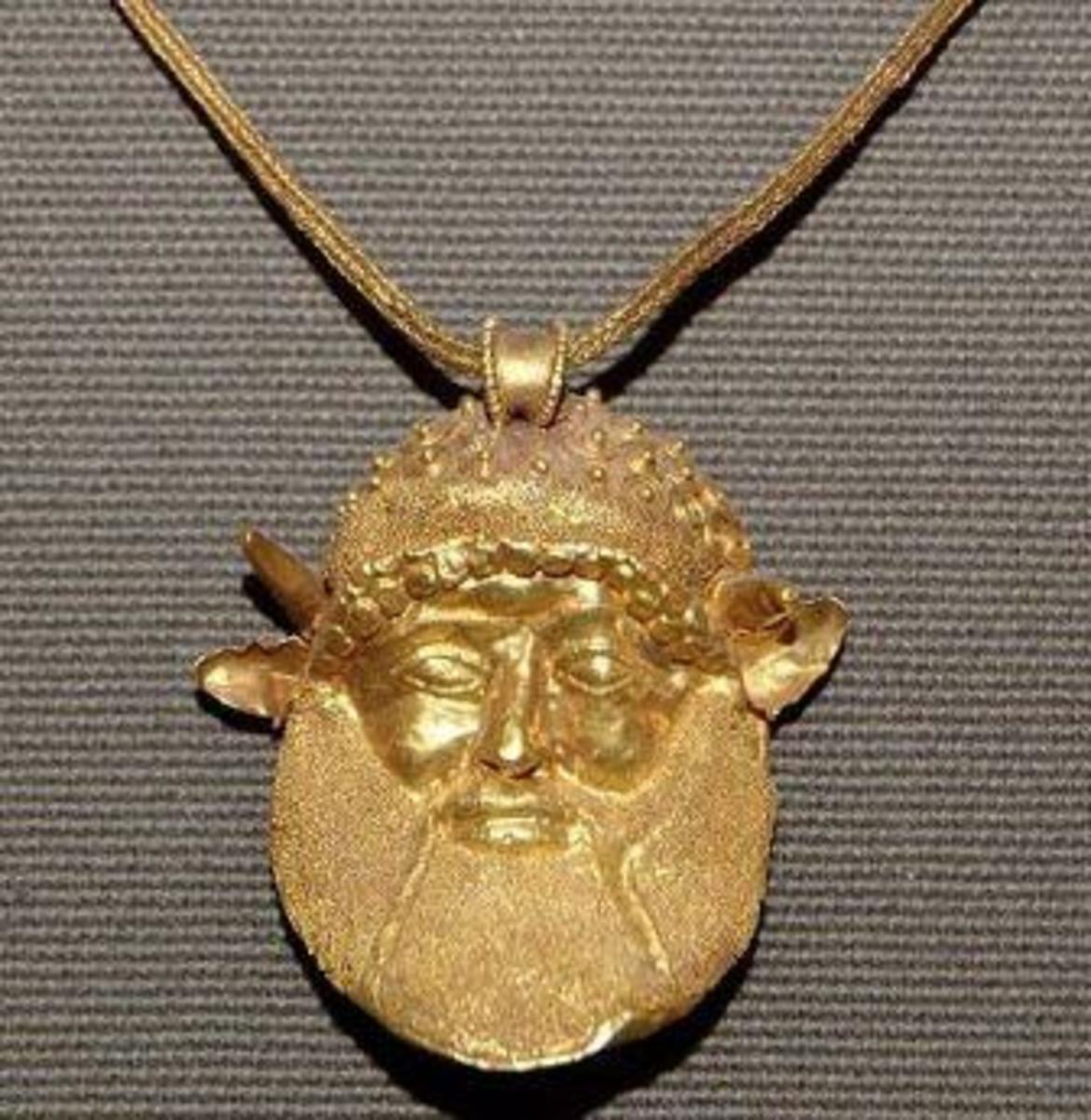 Ancient Greek jewelry charm of the past