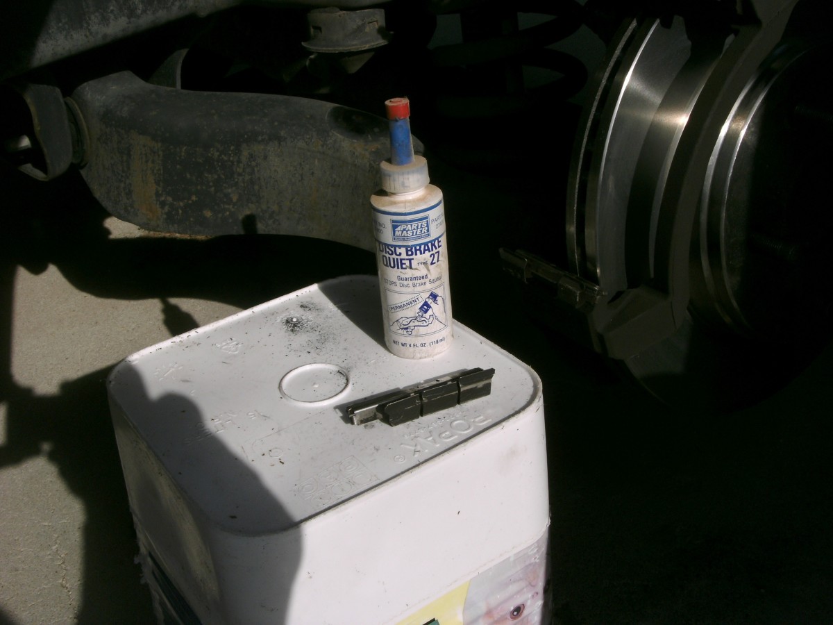 Dodge Ram 1500 How to Change Front Disc Brake Pads or Rotors AxleAddict