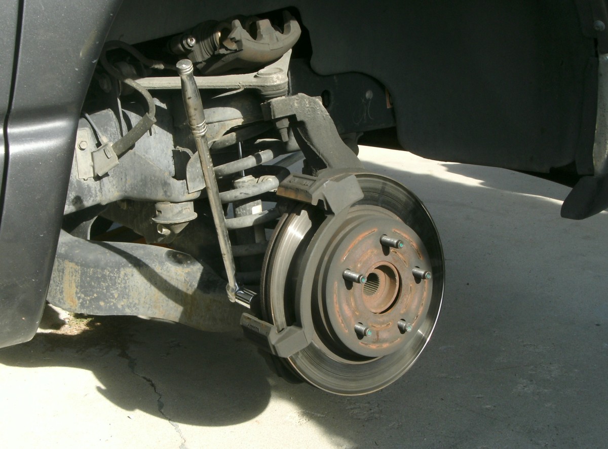 Dodge Ram 1500 How to Change Front Disc Brake Pads or Rotors AxleAddict