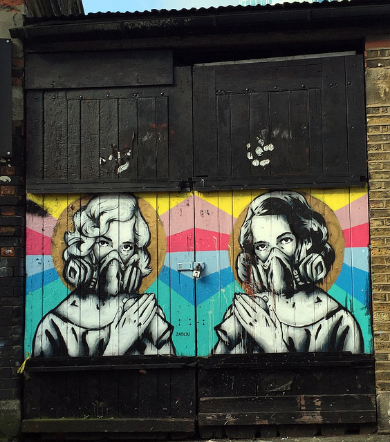 Banksy Street Art in Chicago Baby Carriage Stairs and Mother