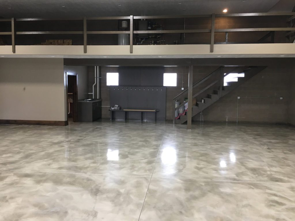 The Look, Benefits, & Cost Of A Marble Epoxy Floor