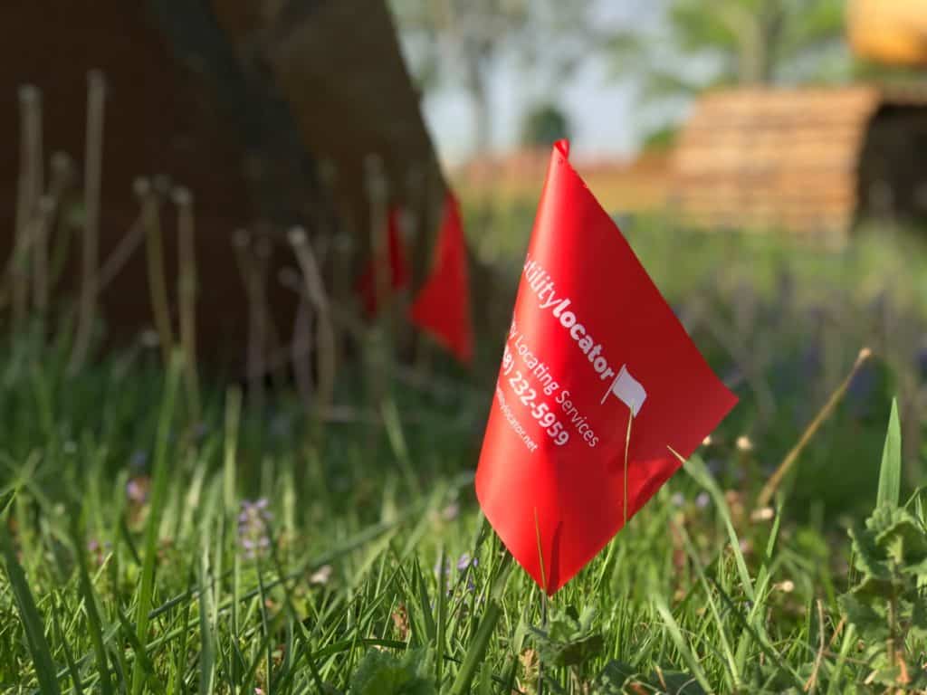 What are these little colored flags in my yard? Utility Locator
