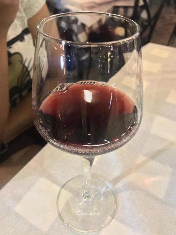 wine in a glass at Meteora