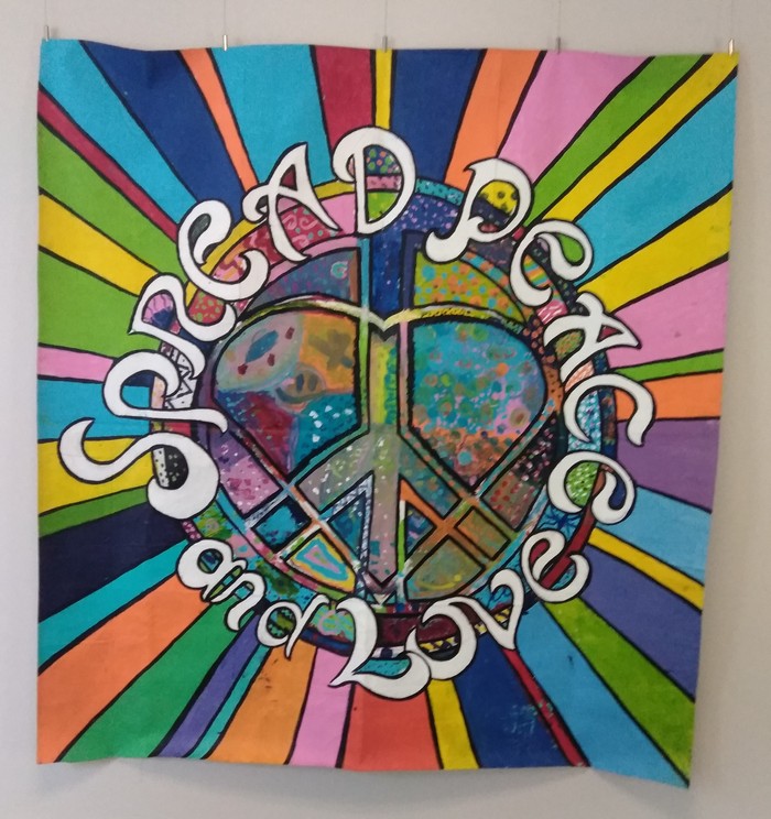 “Spread Peace and Love” mural by 50 third graders from Ventura Charter