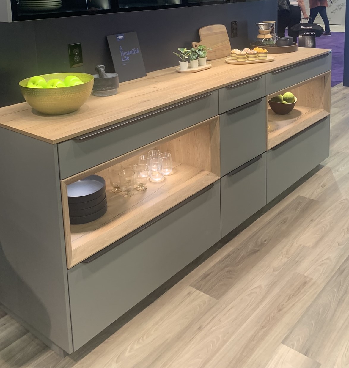 wood open shelves in grey island